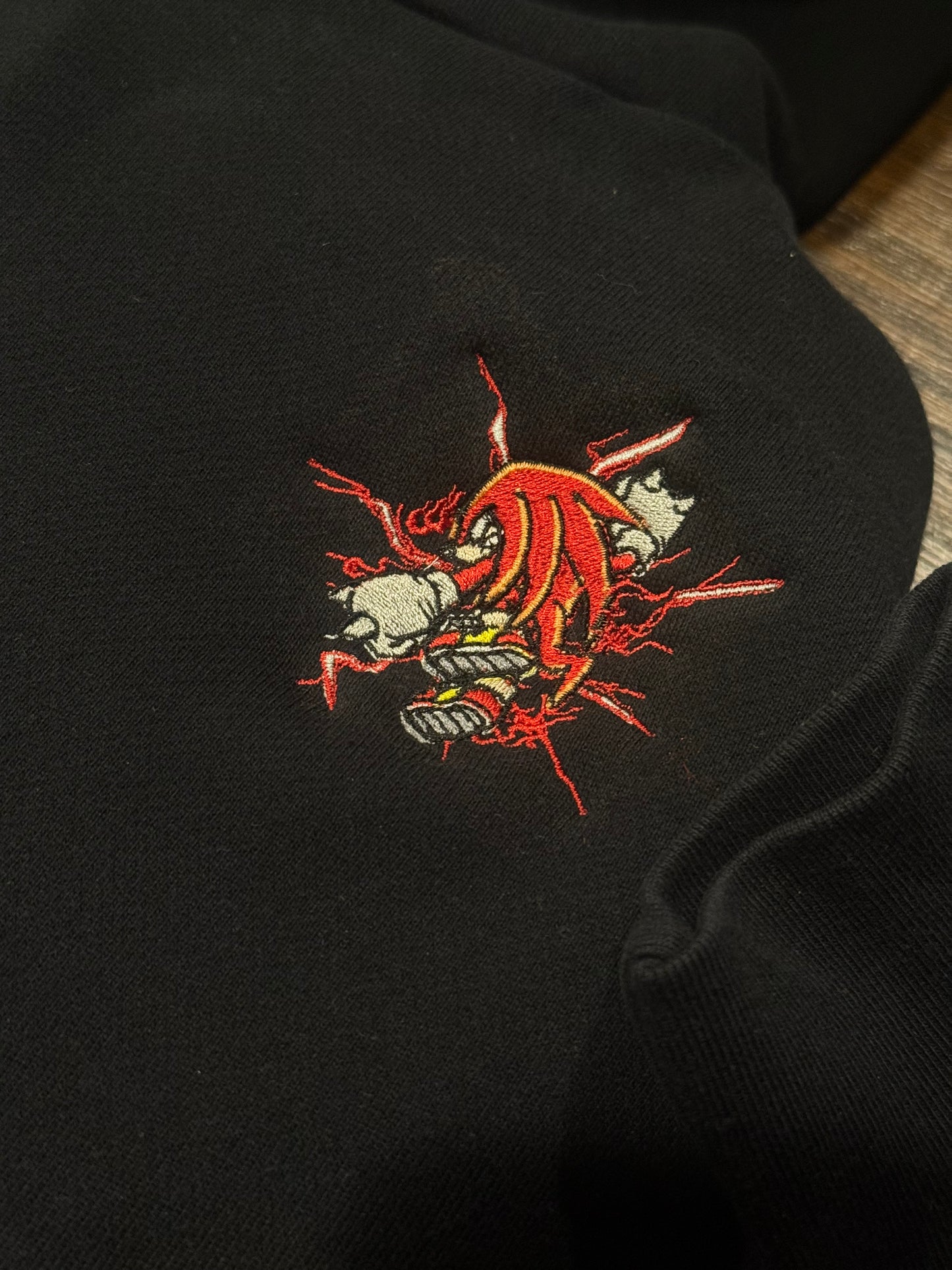 Embroidered Left Chest Knuckles Hoodie, Sweatshirt, & Tee