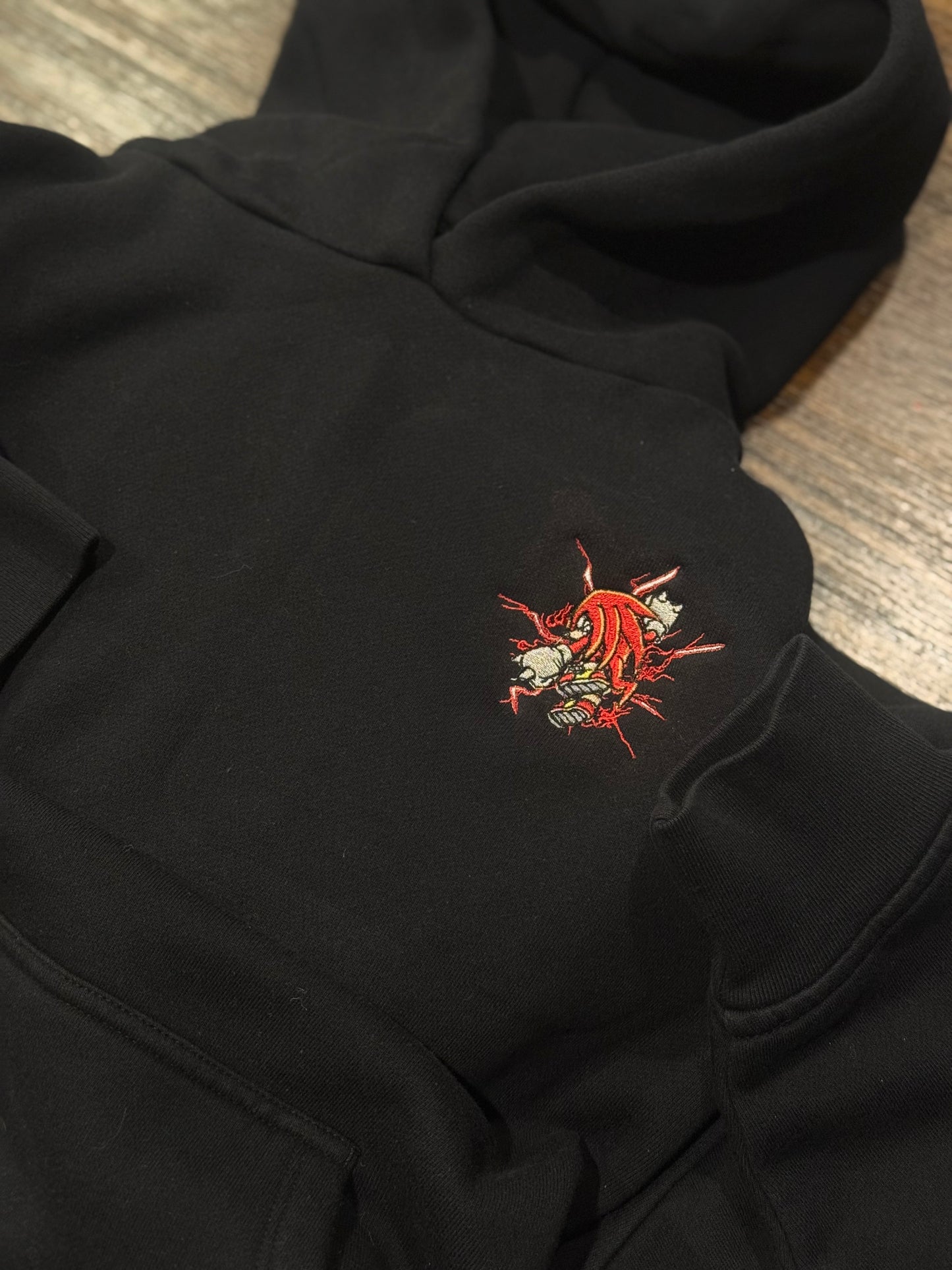 Embroidered Left Chest Knuckles Hoodie, Sweatshirt, & Tee